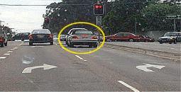 General Knowledge - You are turning right from one of two right turn only lanes. How should you use your indicators?