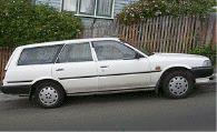 General Knowledge - Check all that apply. You want to leave your automatic car parked on a street sloping uphill. You should: