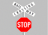 Intersections - What should you do on approaching a railway level crossing displaying a STOP sign?