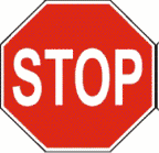 Intersections - You drive up to an intersection with a stop sign. There is no painted stop line. Where should you stop?