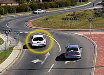 Intersections - In this roundabout with two lanes, can the marked car turn right?