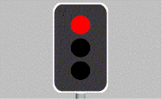 Traffic Lights Lanes - As you approach an intersection with traffic lights, the yellow light turns to red. You must: